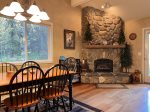 Dining Area for Six with Hardwood Floors and Gas Fireplace 